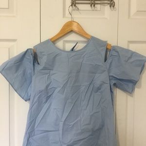 Blouse with draped sleeves and bow in back